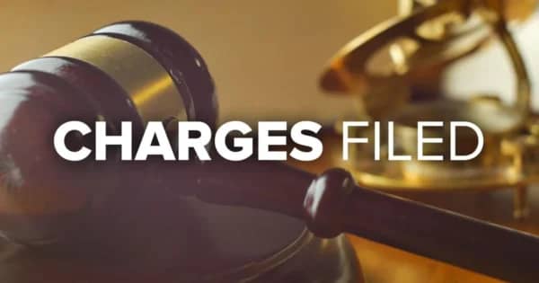 Two Charged with Perverting the Course of Justice in Robbery Investigation