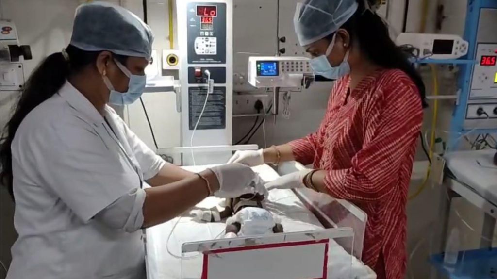 India 20-day-old baby girl found buried fighting for life
