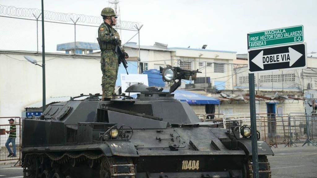 Guard and 13 inmates killed in Ecuador prison fight