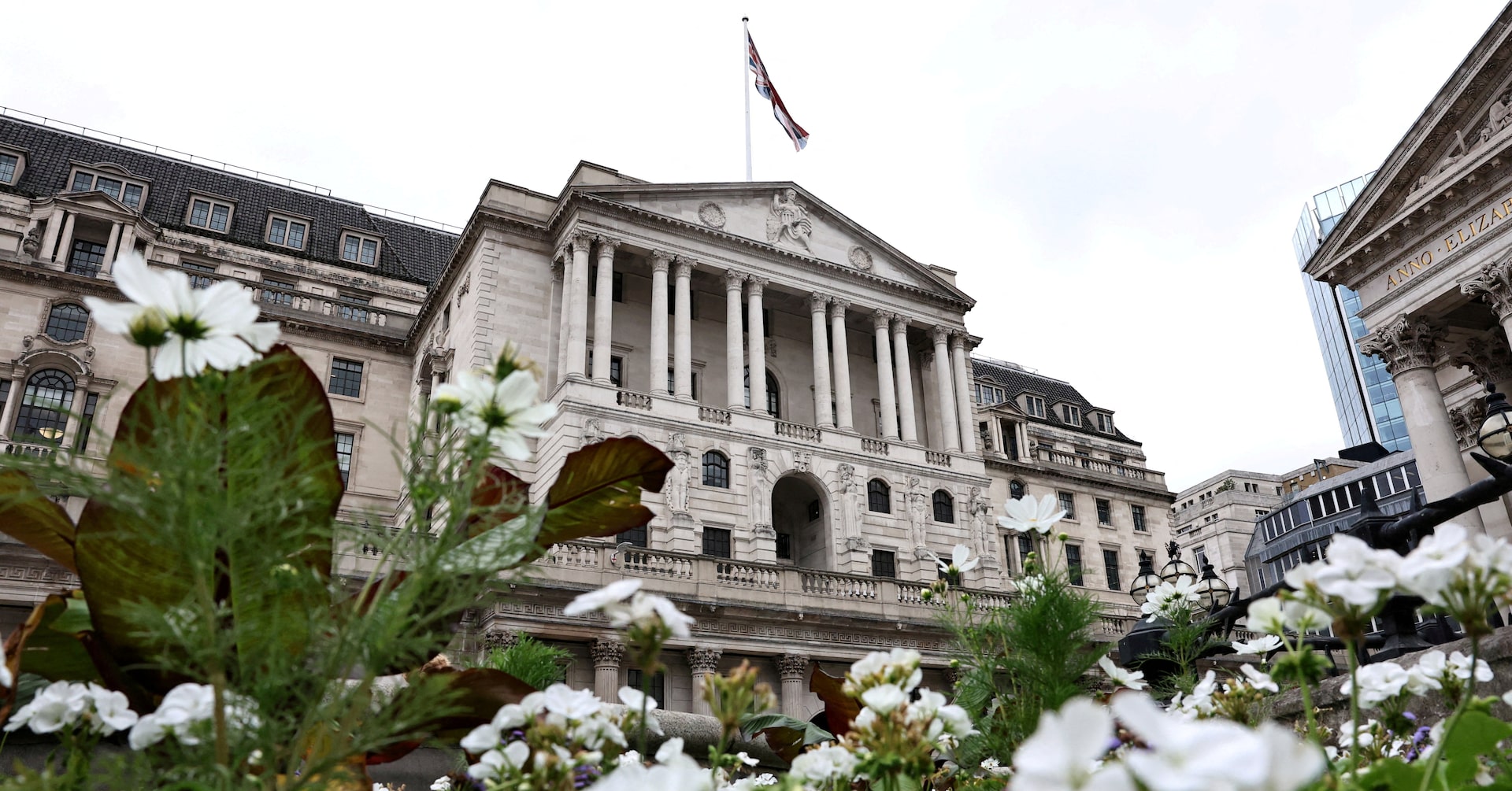 Bank of England slows pace of bond rundown and keeps rates on hold