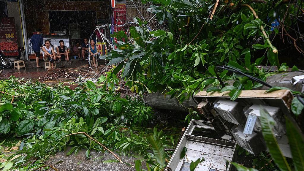 Typhoon kills at least 11 as it sweeps through Vietnam