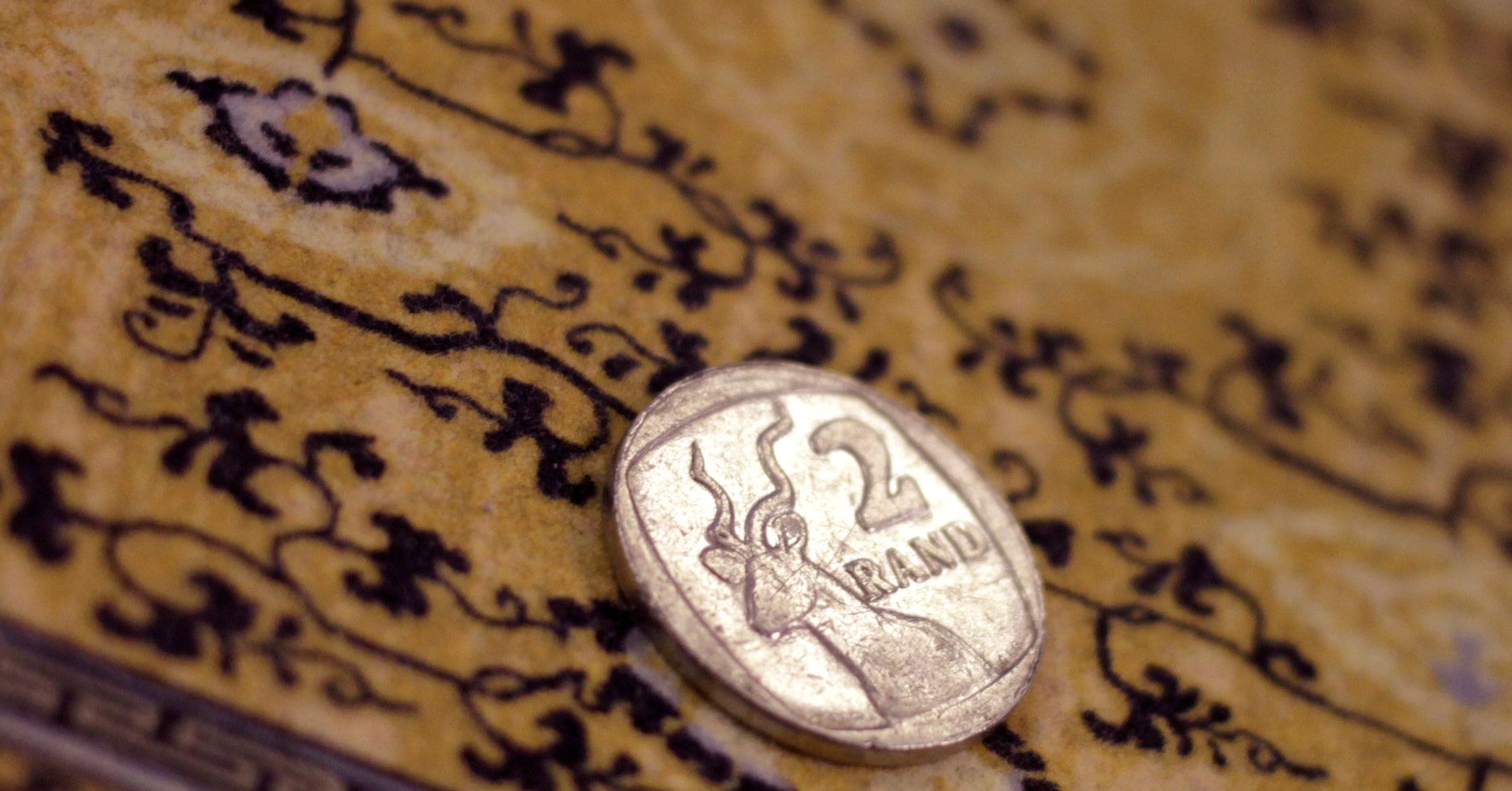 South African rand steady as investors mull central bank decision, US trade talks