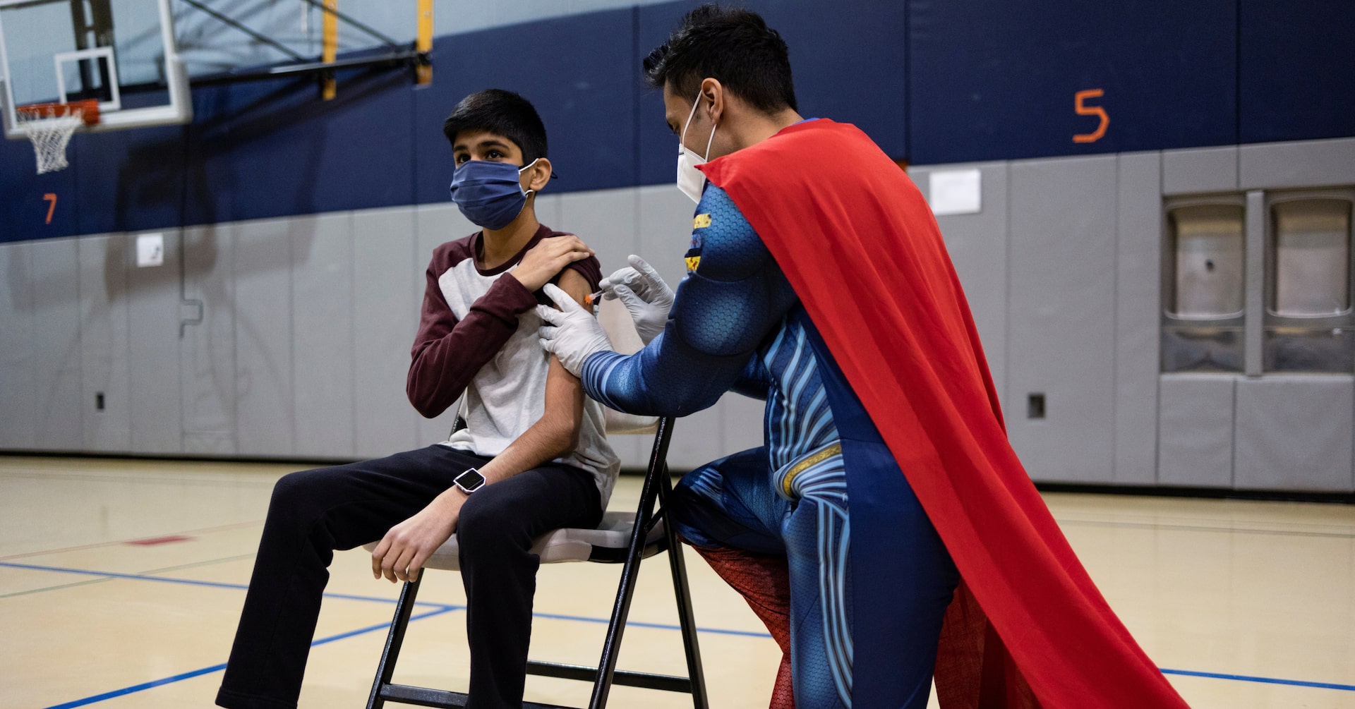 Pennsylvania pharmacist keeps vaccine Superman suit on hand