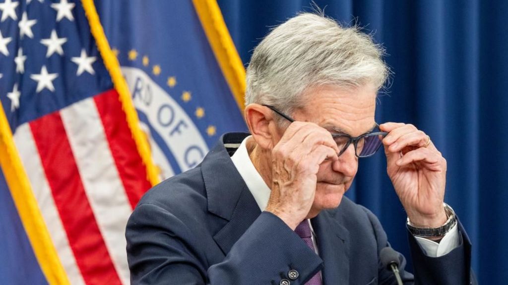 Fed Reserve cuts interest rates but cautions over stalling job market
