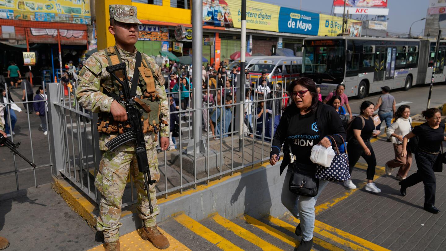 Military and police patrol streets of Peru’s capital as state of emergency begins