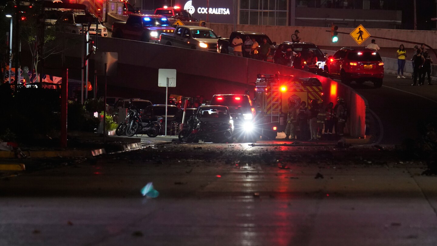 Pickup truck explodes on busy street in Ecuador