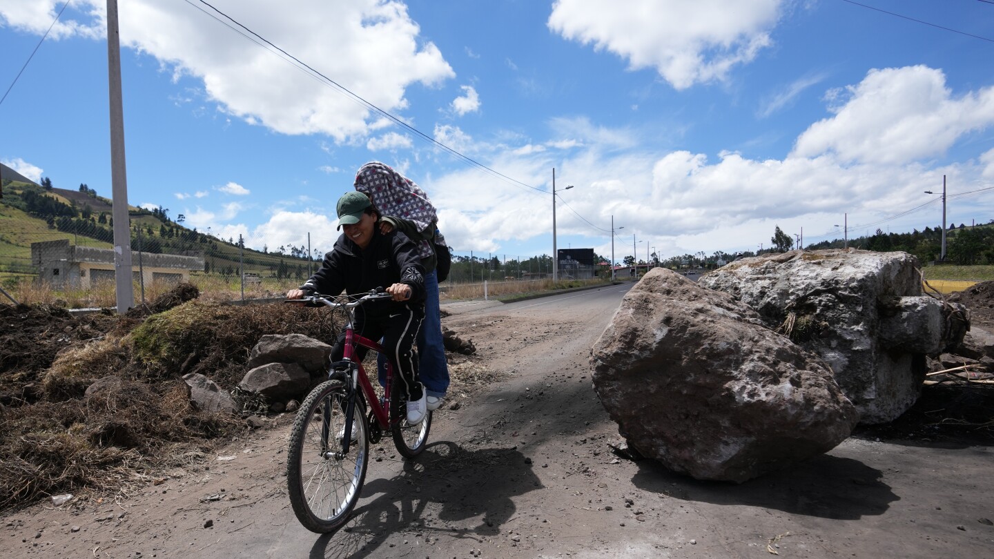 Protesters rally for and against Ecuador’s president as emergency takes effect in 10 provinces