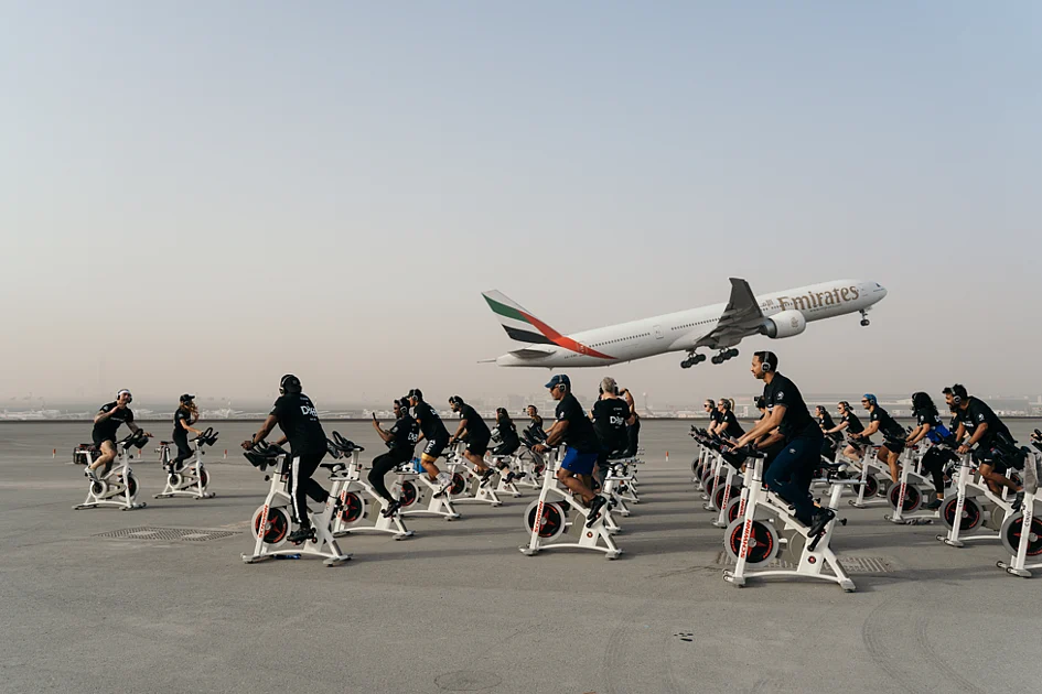 Look: Dubai transforms DXB runway into cycling arena as flights soar overhead