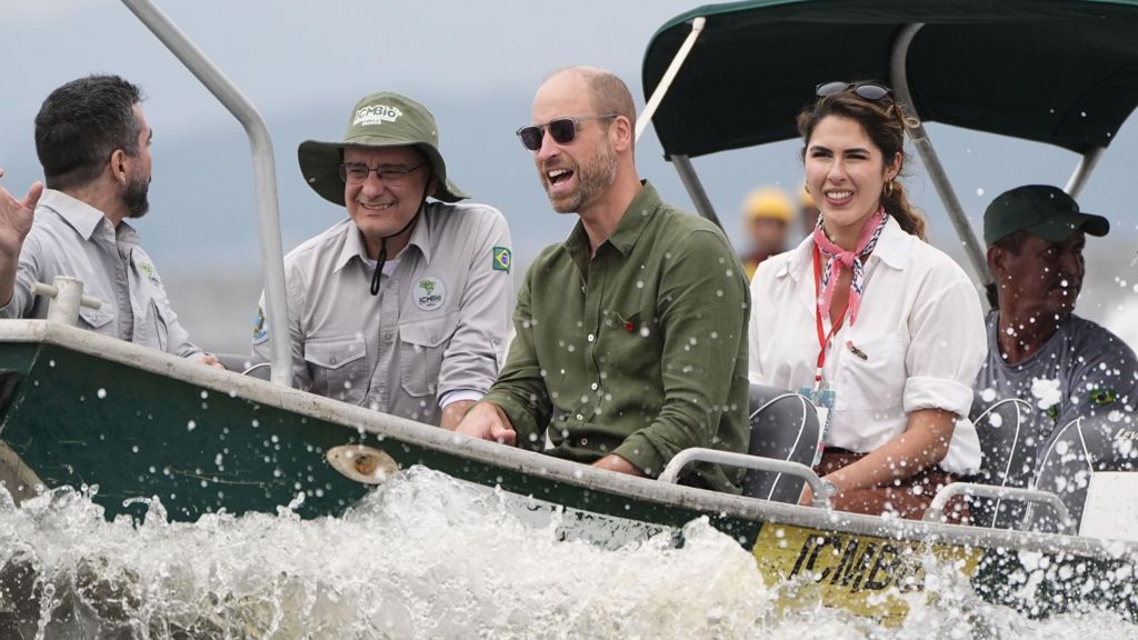 Planting trees and cuddling babies: William visits Brazilian island