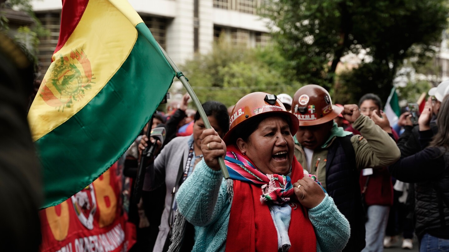 Miners clash with police in Bolivia as protests over fuel subsidies enter second week