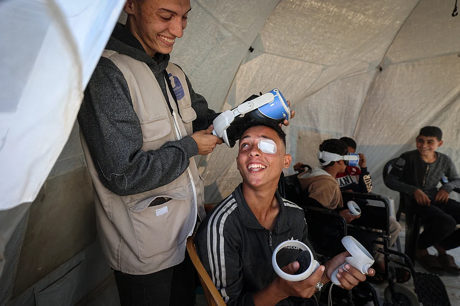 VR headsets take war-scarred children to world away from Gaza