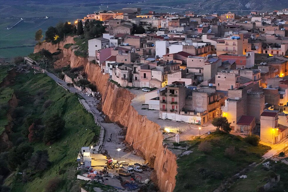 Huge landslide cleaves off the edge of a town in Sicily and forces the evacuation of 1,500 people