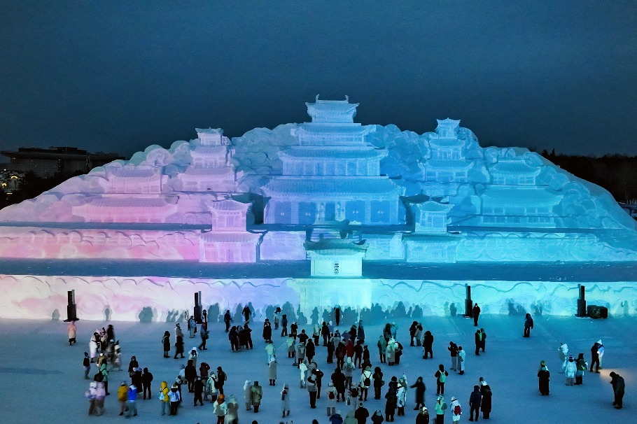Massive snow palace sculpture rises in Jilin province
