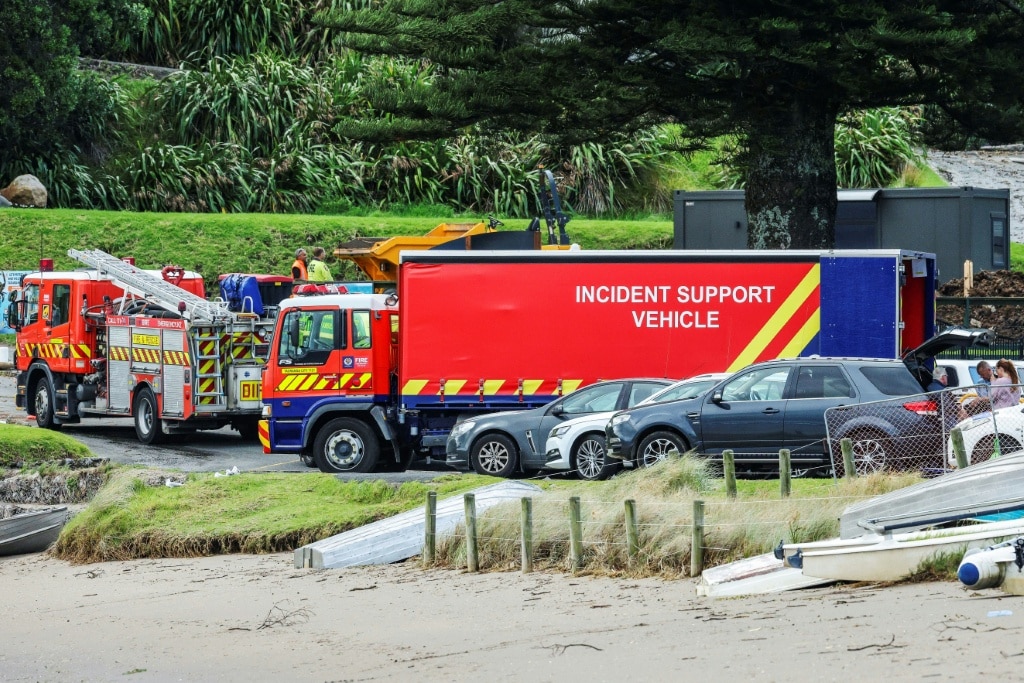 Workers dig for the missing in New Zealand landslide