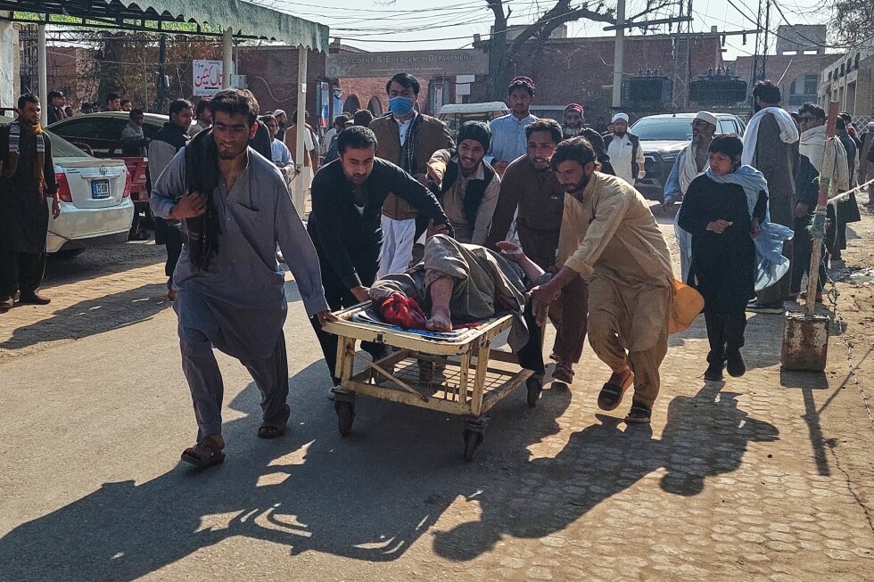 Motorcycle bomb at police station kills at least 2 and wounds several in northwestern Pakistan