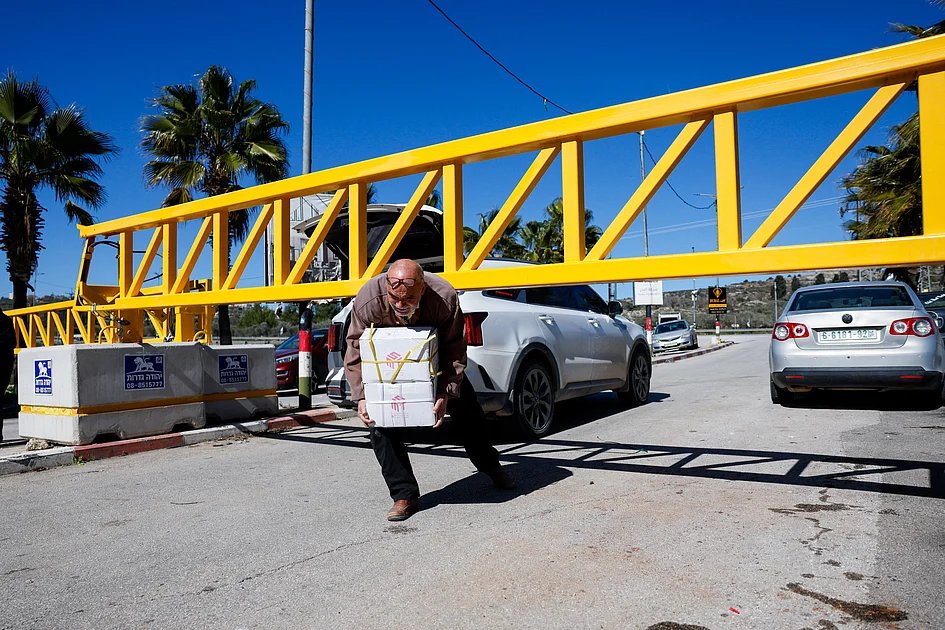 Israel approves steps making it easier for West Bank settlers to buy land, media says