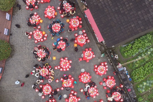 Villagers enjoy Spring Festival gala in Shenshan village, China’s Jiangxi