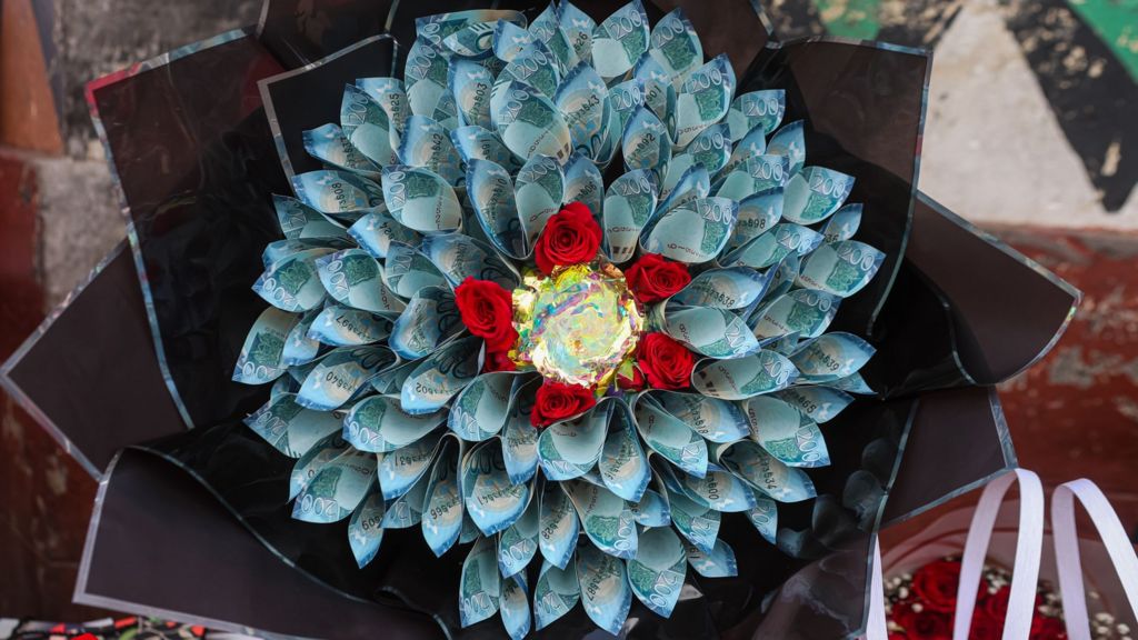 Kenyans drop flowers for Valentine’s bouquets of cash. Not everyone is impressed