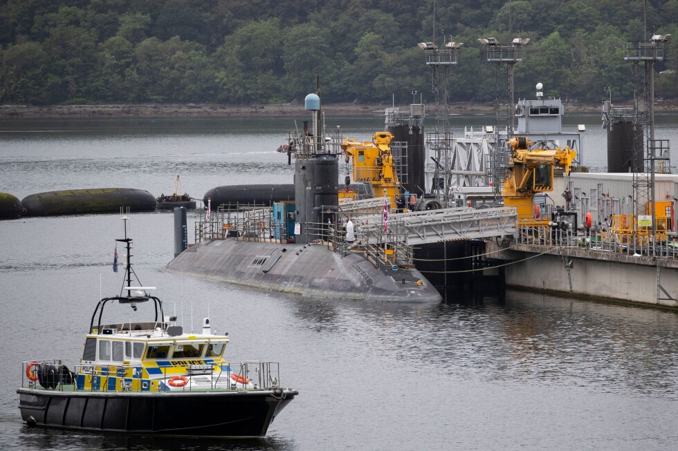 Iranian and Romanian charged after trying to enter UK’s nuclear submarine base