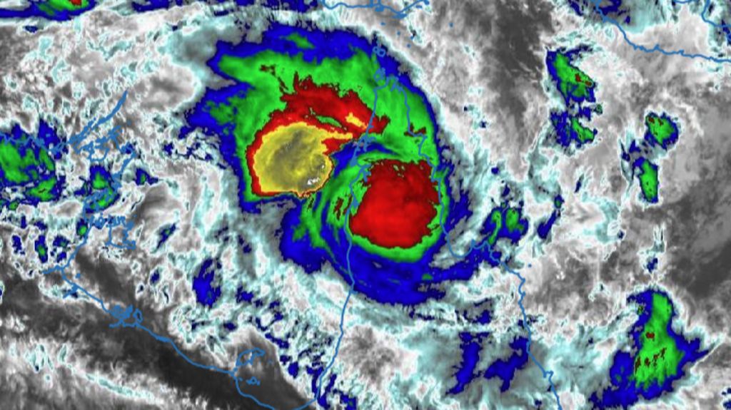 Australians told to shelter in place as Tropical Cyclone Narelle hits Queensland