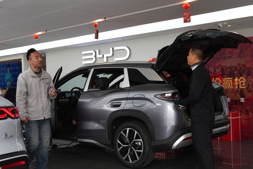 China’s BYD sees first profit drop since 2021, even as the Tesla-rival takes global EV crown