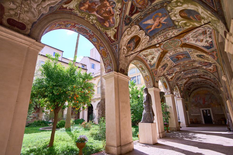 A hidden cloister in the center of Rome has a turbulent past etched on its walls