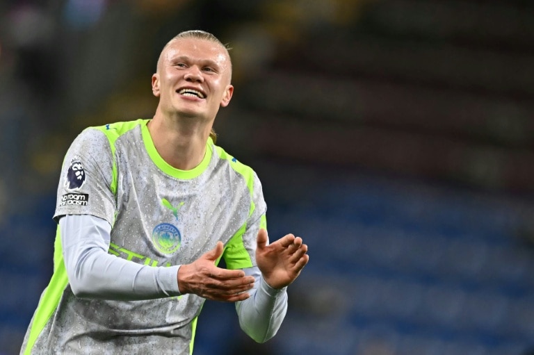 Manchester City go top of Premier League as Burnley relegated