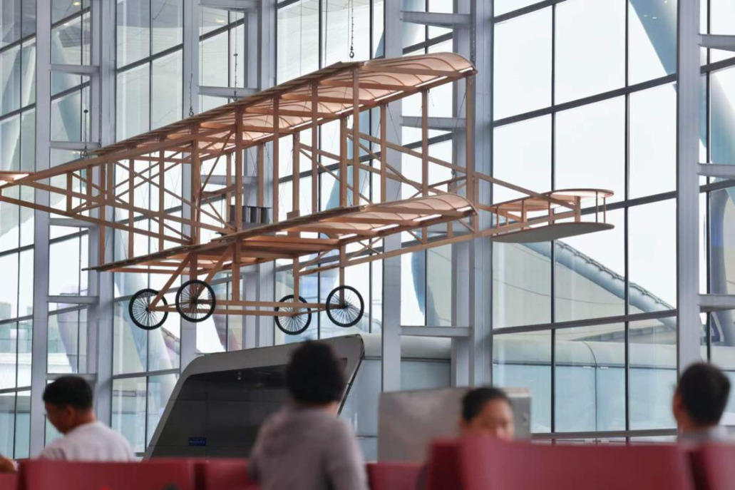 Guangzhou airport unveils replica of China’s first airplane