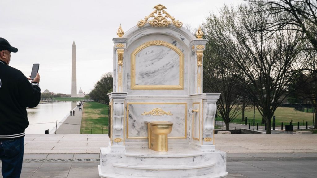 ‘Art is a very powerful tool’ – Golden toilet throne appears in DC