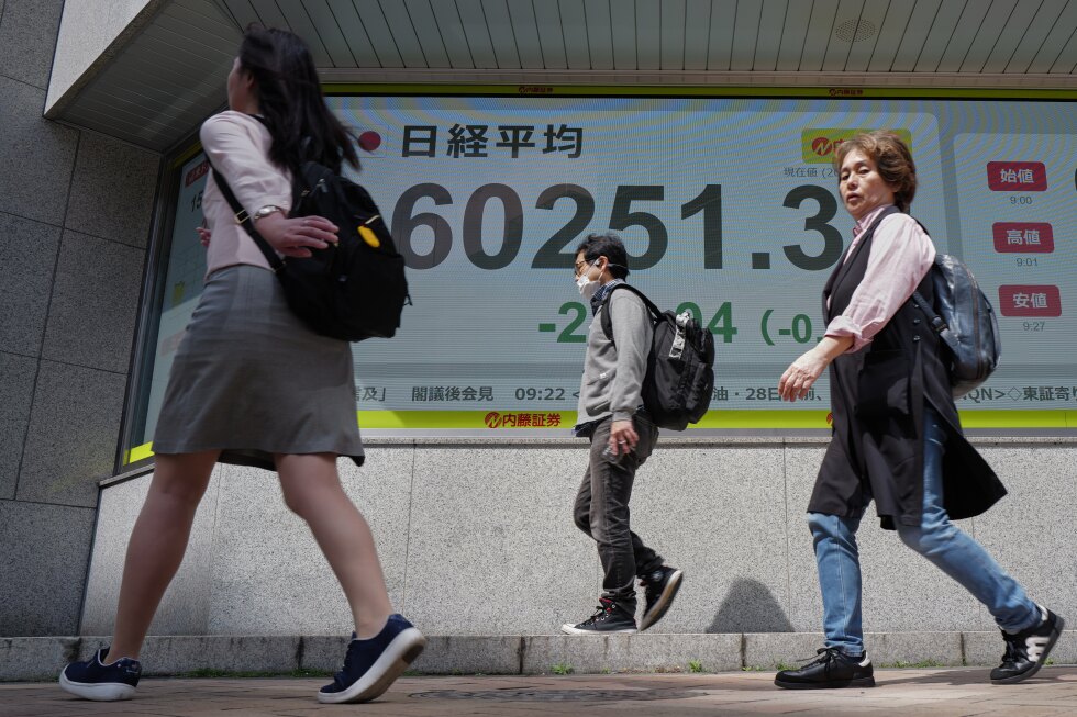 Japan’s central bank holds its key rate steady amid worries about the Iran war and energy prices
