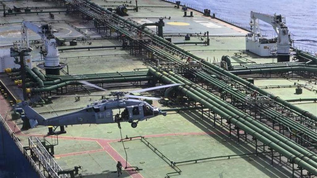 US boards ship carrying Iran oil as Trump threatens mine-laying vessels