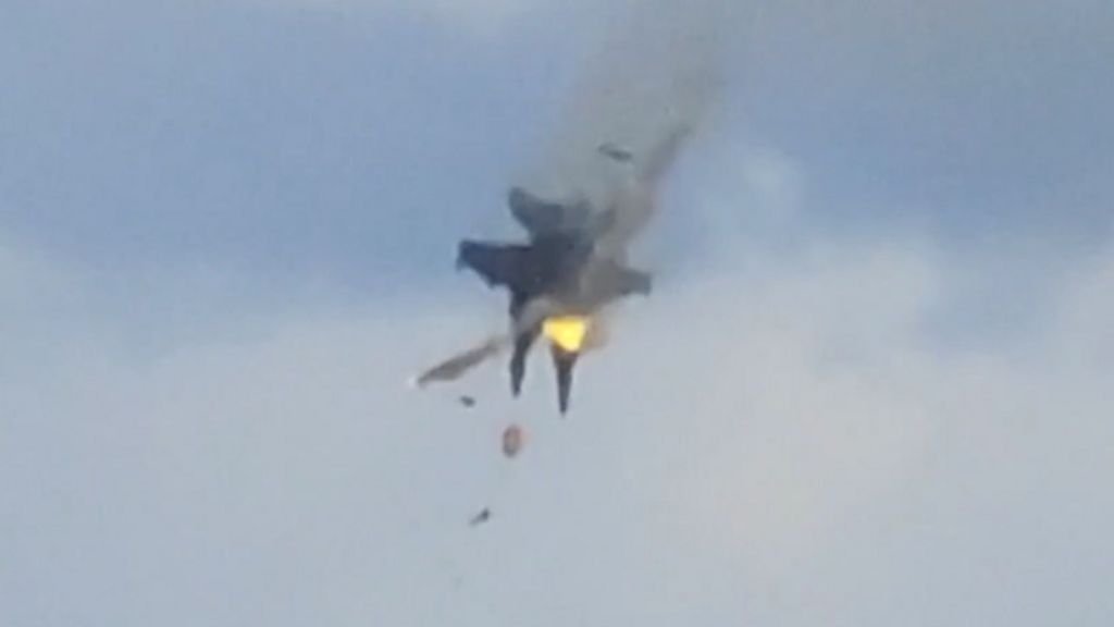 Moment two fighter jets collide mid-air at US air show