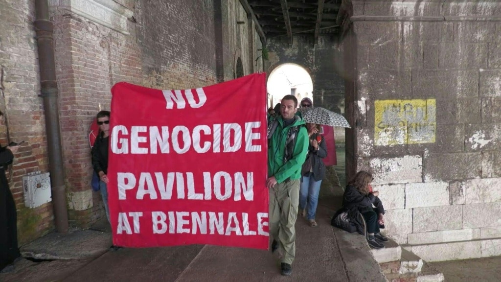 Protests as Venice Biennale opens in turmoil over Russian presence