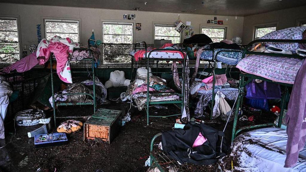 Texas camp where 25 girls died drops reopening plans after parents protest