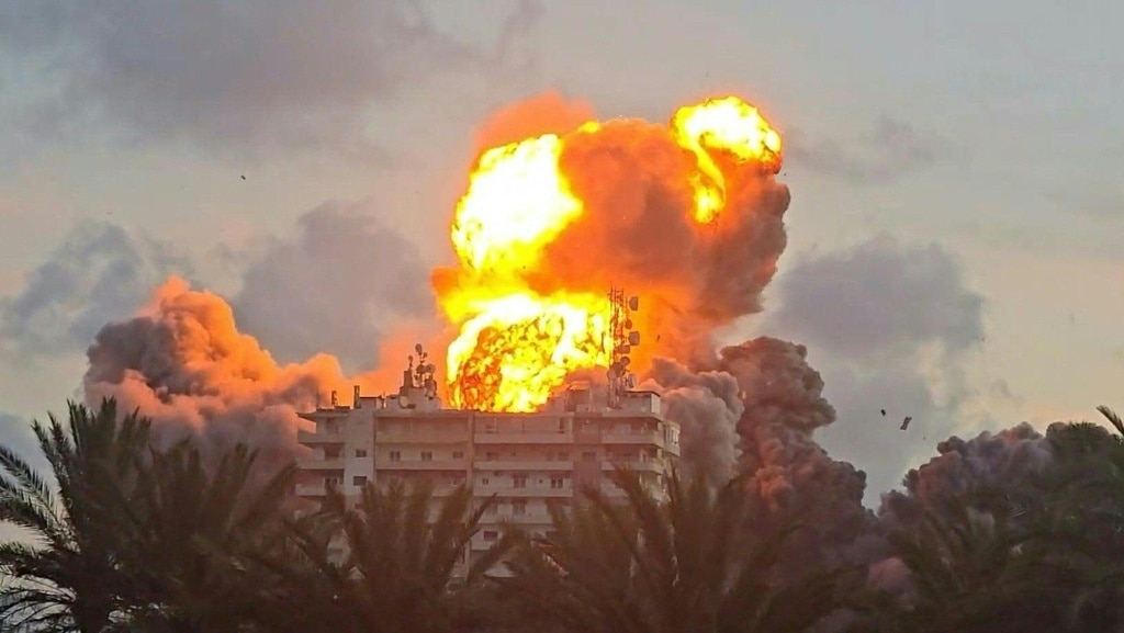 Israeli strike near Beirut as Lebanon says raids kill 14