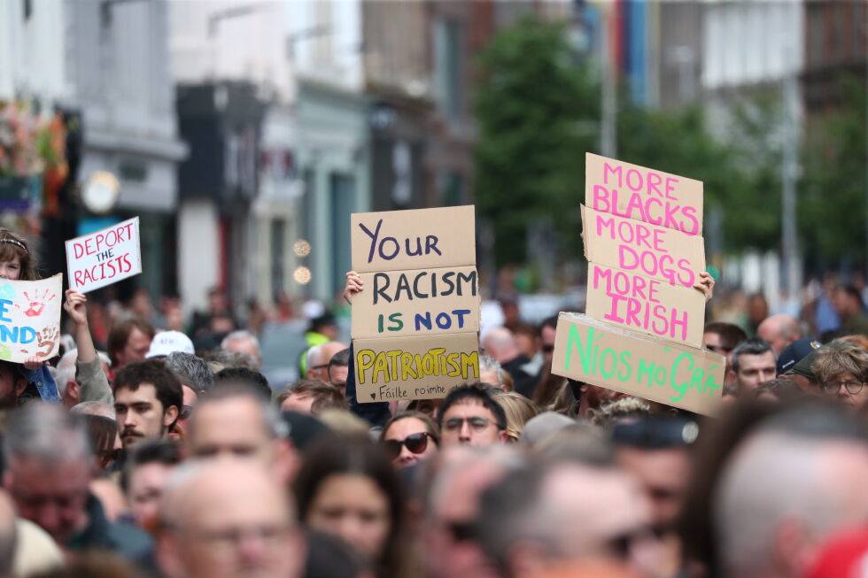 Thousands rally in Belfast to condemn anti-immigrant rioting that followed stabbing