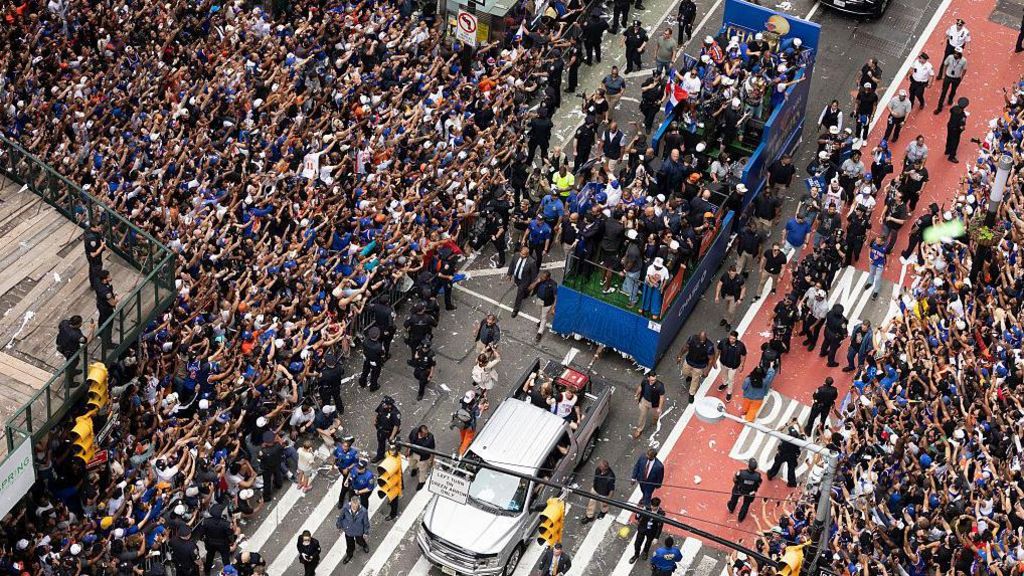 ‘City united after so long’: New Yorkers rejoice in Knicks’ championship parade
