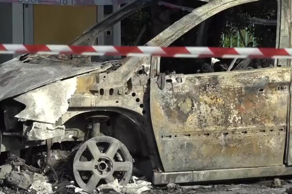 Police in Italy arrest 2 people after apparent torching of a car kills 4 farmworkers