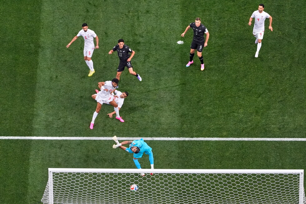 One Extraordinary Photo: An overhead look at New Zealand’s Elijah Just scoring against Iran