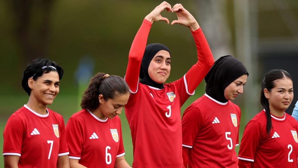 Banned from football at home, Afghan women’s team reunite 8,000 miles away