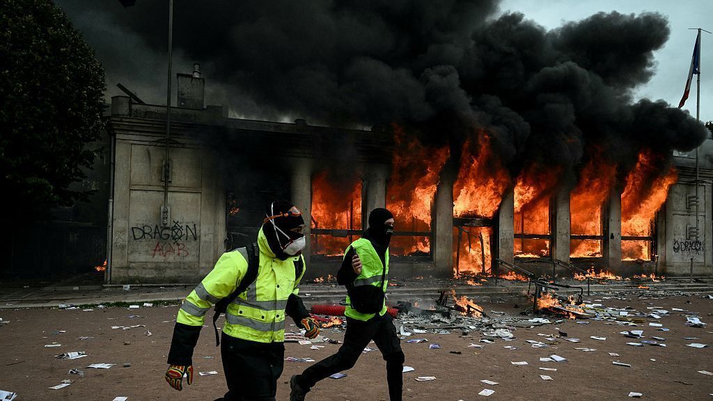 Hundreds arrested in France as police clash with protesters